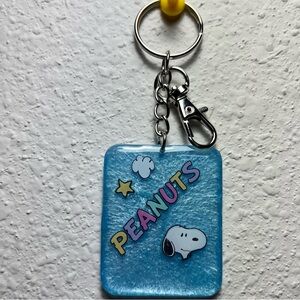 Peanuts Blue Snoopy Keychain with key ring and clip hook.